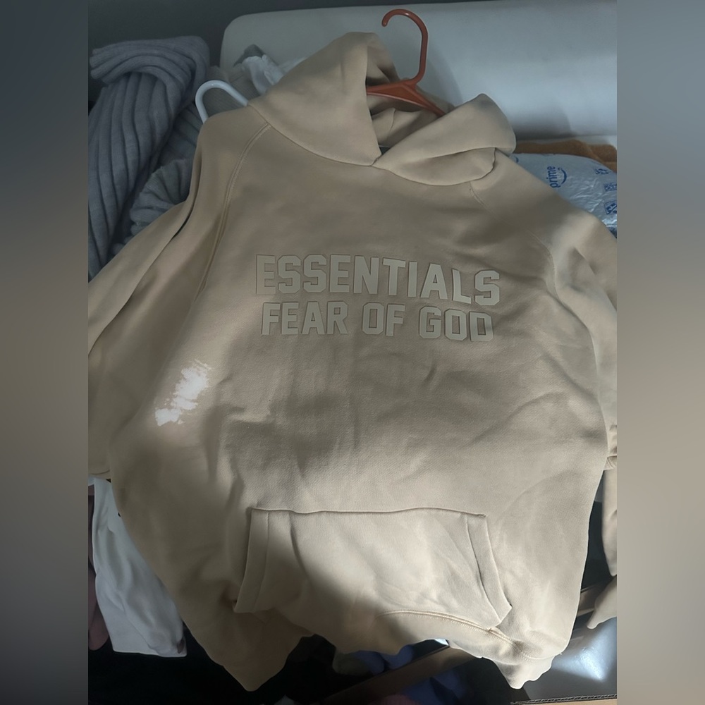 Fear of God Essentials SS23 Sand Tan Hoodie (Has a Bleach Spot) as pictured